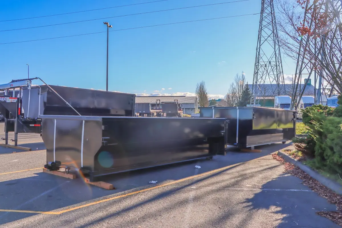 Roll-off dumpster ready for waste disposal at job site for 2 Yard Dumpster Rental in Bloomingdale
